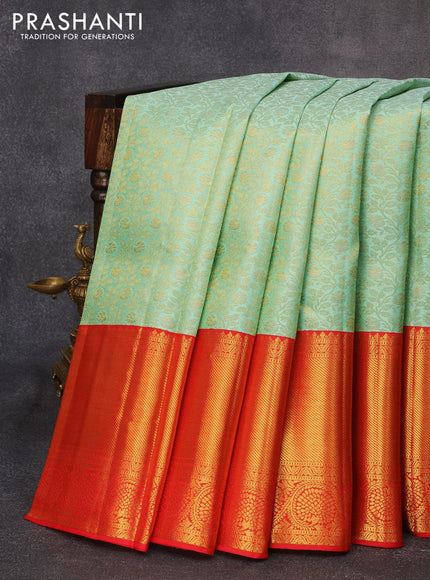 Pure kanjivaram silk saree teal shade and red with allover zari woven floral brocade weaves and long zari woven floral border