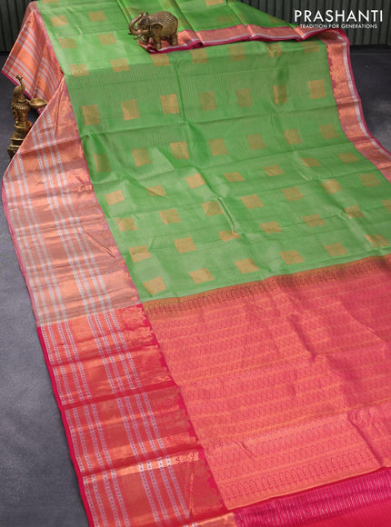 Pure kanjivaram silk saree green and pink with allover silver & copper zari woven stripe & buttas and long rich zari woven border