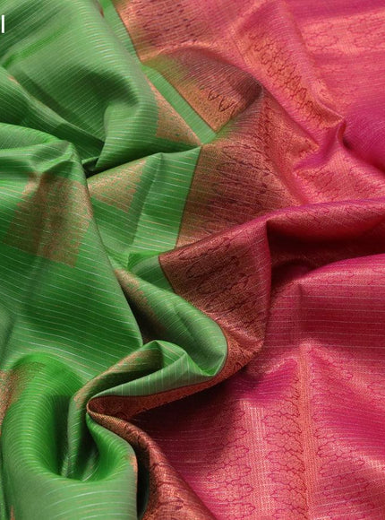 Pure kanjivaram silk saree green and pink with allover silver & copper zari woven stripe & buttas and long rich zari woven border