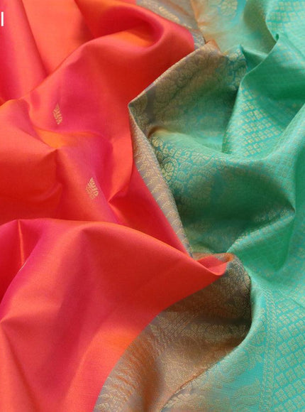 Pure kanjivaram silk saree dual shade of orange and dual shade of teal green with zari woven buttas and zari woven butta border