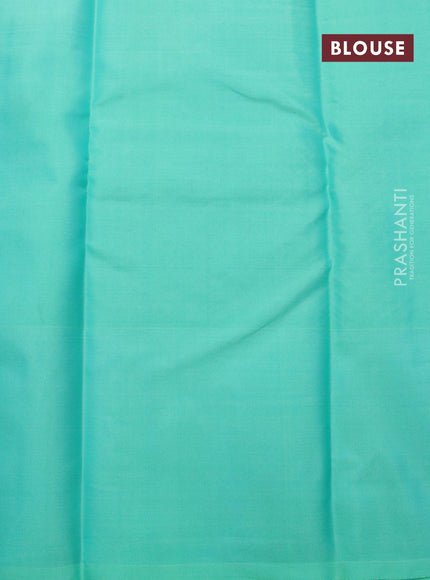 Pure kanjivaram silk saree dual shade of orange and dual shade of teal green with zari woven buttas and zari woven butta border