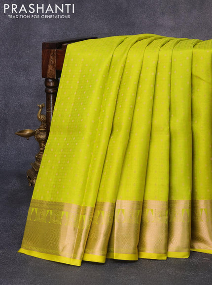 Pure kanjivaram silk saree lime green and lavender with allover self emboss & zari buttas and copper zari woven border