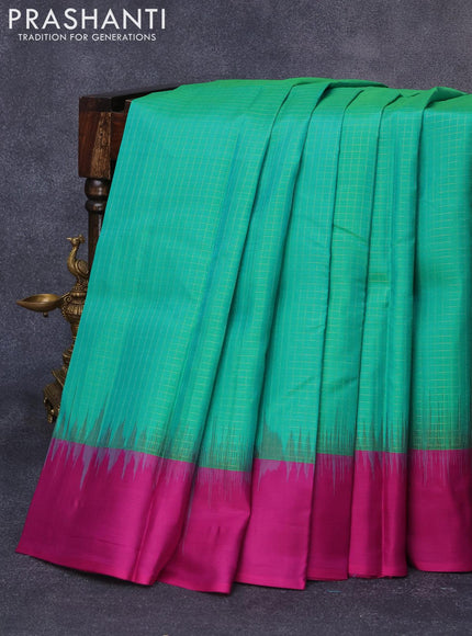 Pure kanjivaram silk saree dual shade of green and purple with allover zari checks pattern and simple border