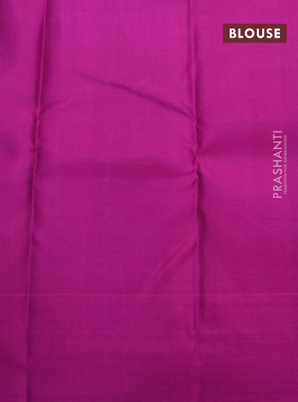 Pure kanjivaram silk saree dual shade of green and purple with allover zari checks pattern and simple border