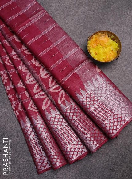 Semi tussar saree maroon with allover batik prints and long temple design silver zari woven border