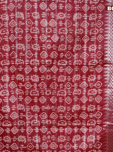 Semi tussar saree maroon with allover batik prints and long temple design silver zari woven border