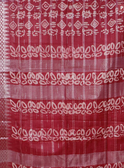 Semi tussar saree maroon with allover batik prints and long temple design silver zari woven border