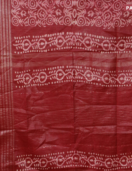 Semi tussar saree dark maroon with allover batik prints and long zari woven border