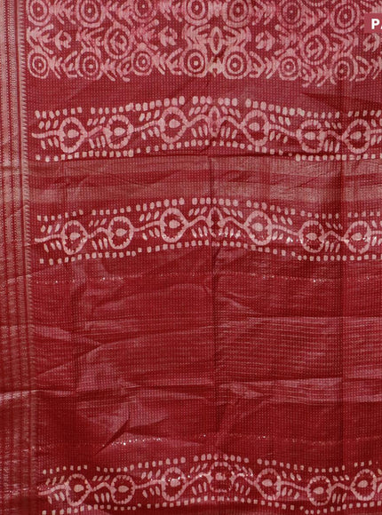 Semi tussar saree dark maroon with allover batik prints and long zari woven border