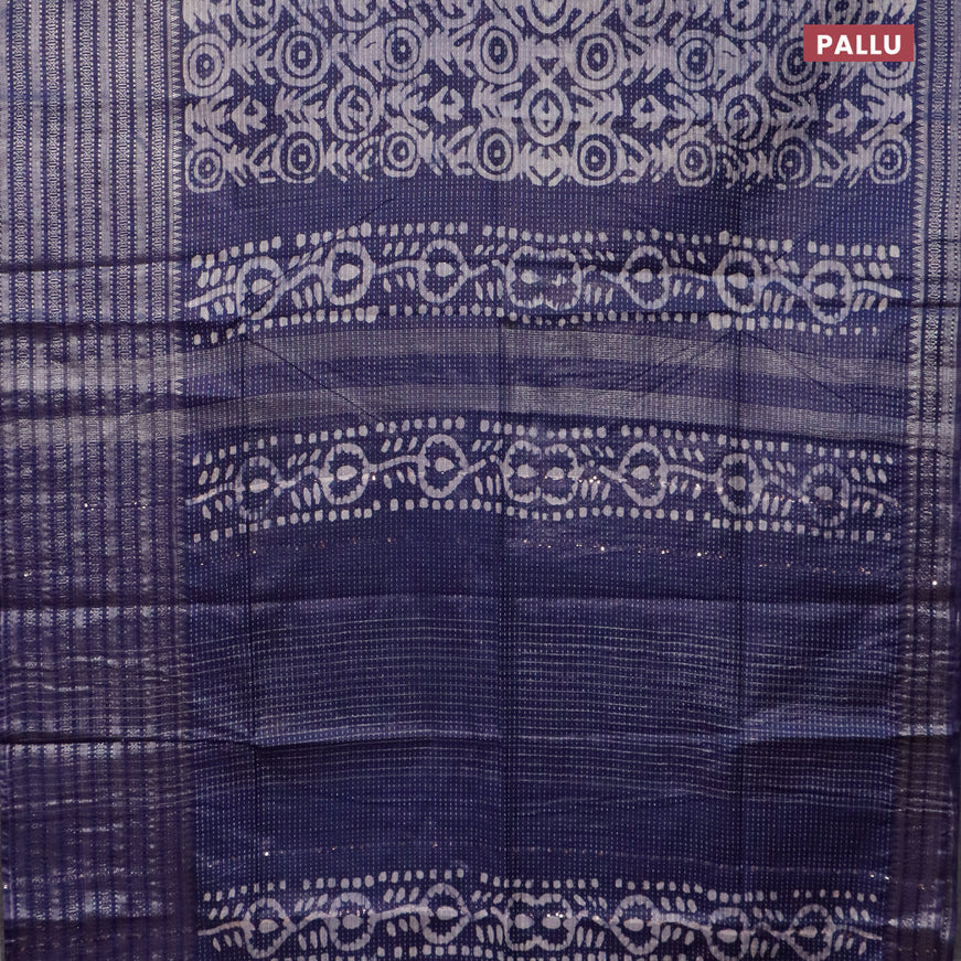 Semi tussar saree navy blue with allover batik prints and long silver zari woven border