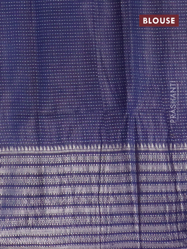 Semi tussar saree navy blue with allover batik prints and long silver zari woven border