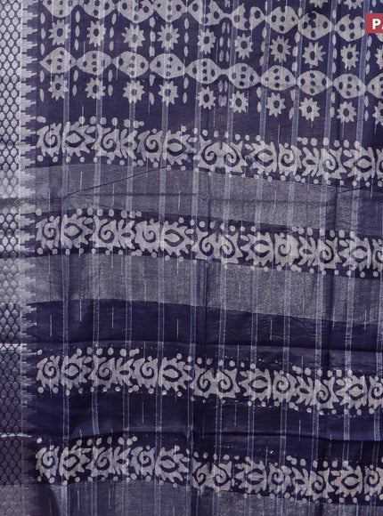 Semi tussar saree navy blue and off white with allover batik prints and long temple design silver zari woven border