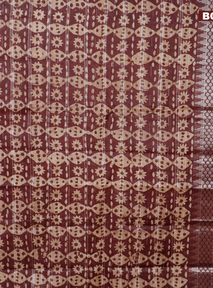 Semi tussar saree coffee brown and beige with allover batik prints and long temple design silver zari woven border