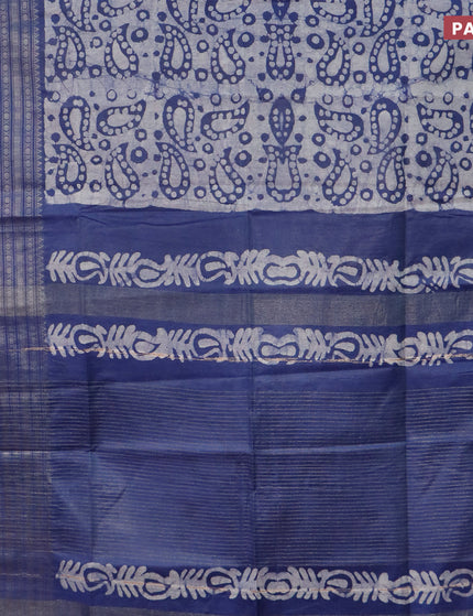 Semi tussar saree blue and off white with allover batik prints and long zari woven border