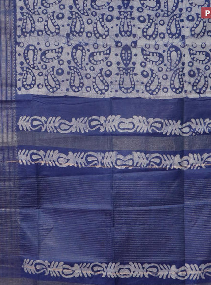 Semi tussar saree blue and off white with allover batik prints and long zari woven border