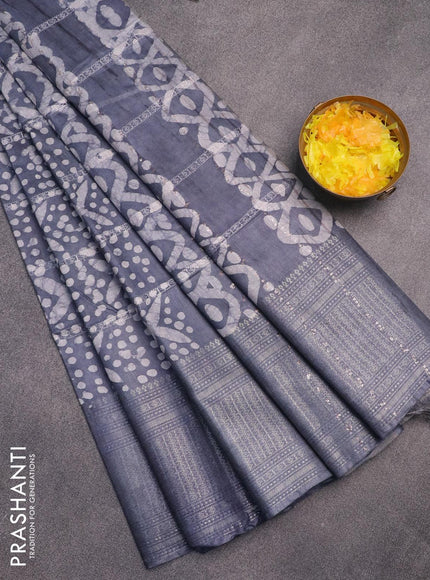 Semi tussar saree grey with allover batik prints and long zari woven border