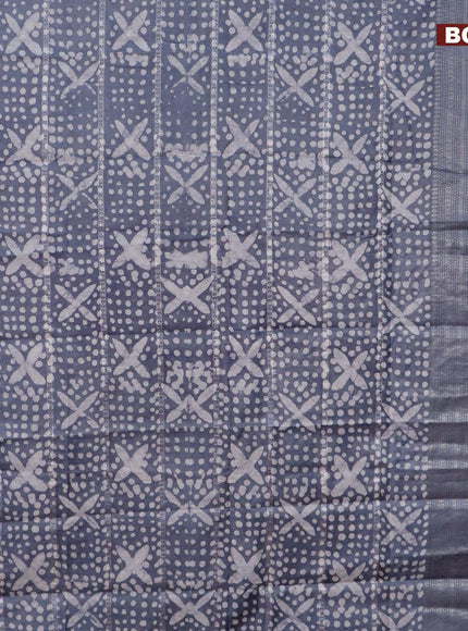 Semi tussar saree grey with allover batik prints and long zari woven border