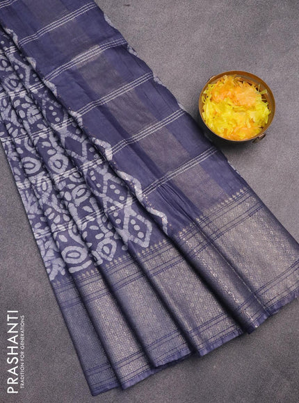 Semi tussar saree grey with allover batik prints and long silver zari woven border