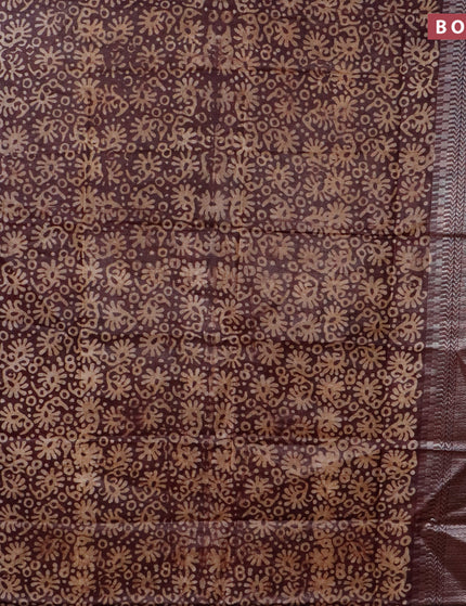 Semi tussar saree coffee brown with allover batik prints and long temple design silver zari woven border