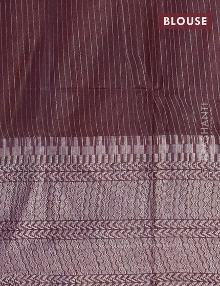 Semi tussar saree coffee brown with allover batik prints and long temple design silver zari woven border