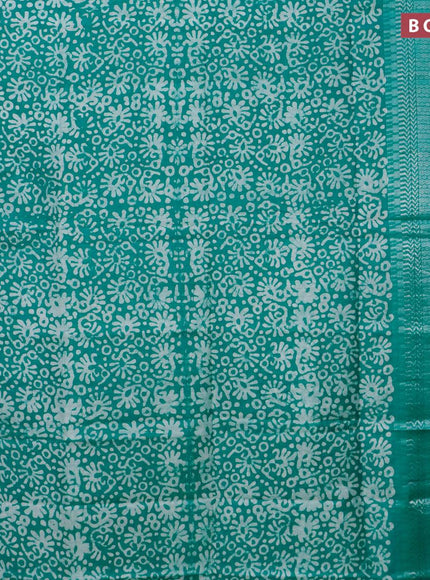 Semi tussar saree teal green with allover batik prints and long temple design silver zari woven border