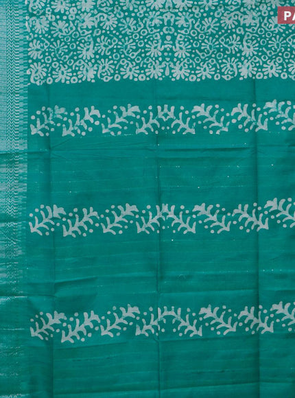 Semi tussar saree teal green with allover batik prints and long temple design silver zari woven border