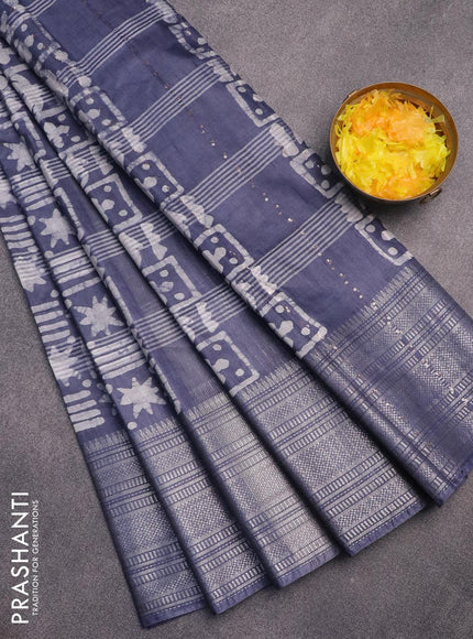 Semi tussar saree grey and off white with allover batik prints and long silver zari woven border