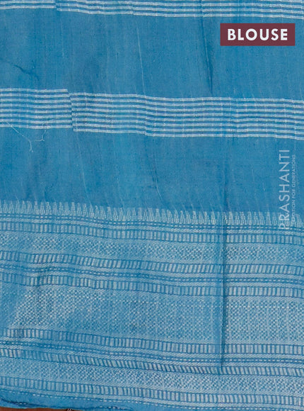 Semi tussar saree peacock blue and off white with allover batik prints and long silver zari woven border