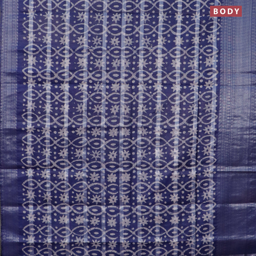 Semi tussar saree navy blue with allover batik prints and long silver zari woven border