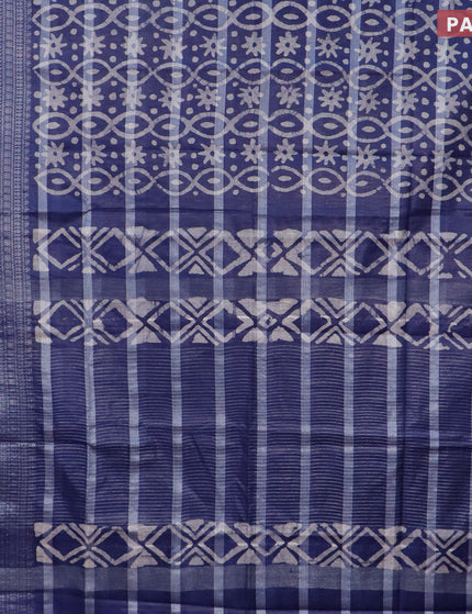 Semi tussar saree navy blue with allover batik prints and long silver zari woven border