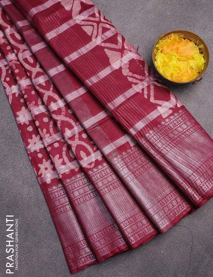 Semi tussar saree maroon with allover batik prints and long silver zari woven border