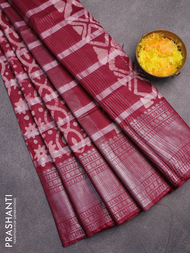 Semi tussar saree maroon with allover batik prints and long silver zari woven border