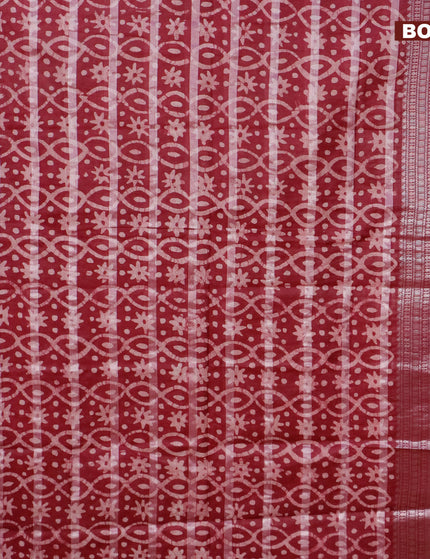 Semi tussar saree maroon with allover batik prints and long silver zari woven border