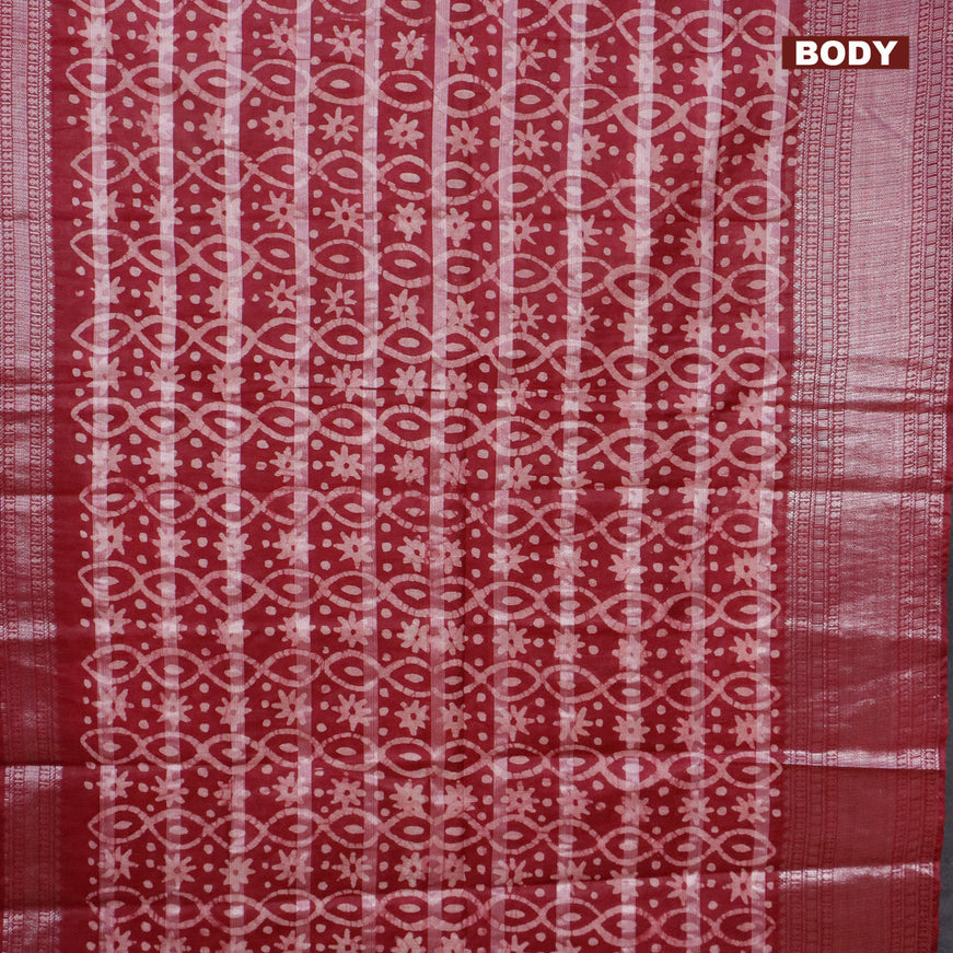 Semi tussar saree maroon with allover batik prints and long silver zari woven border