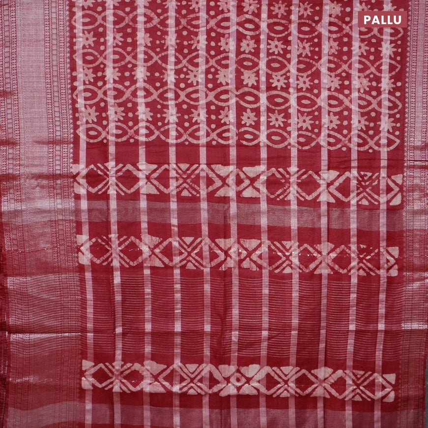 Semi tussar saree maroon with allover batik prints and long silver zari woven border