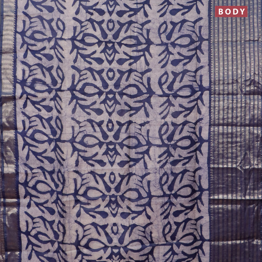 Semi tussar saree off white and navy blue with allover batik prints and long zari woven border