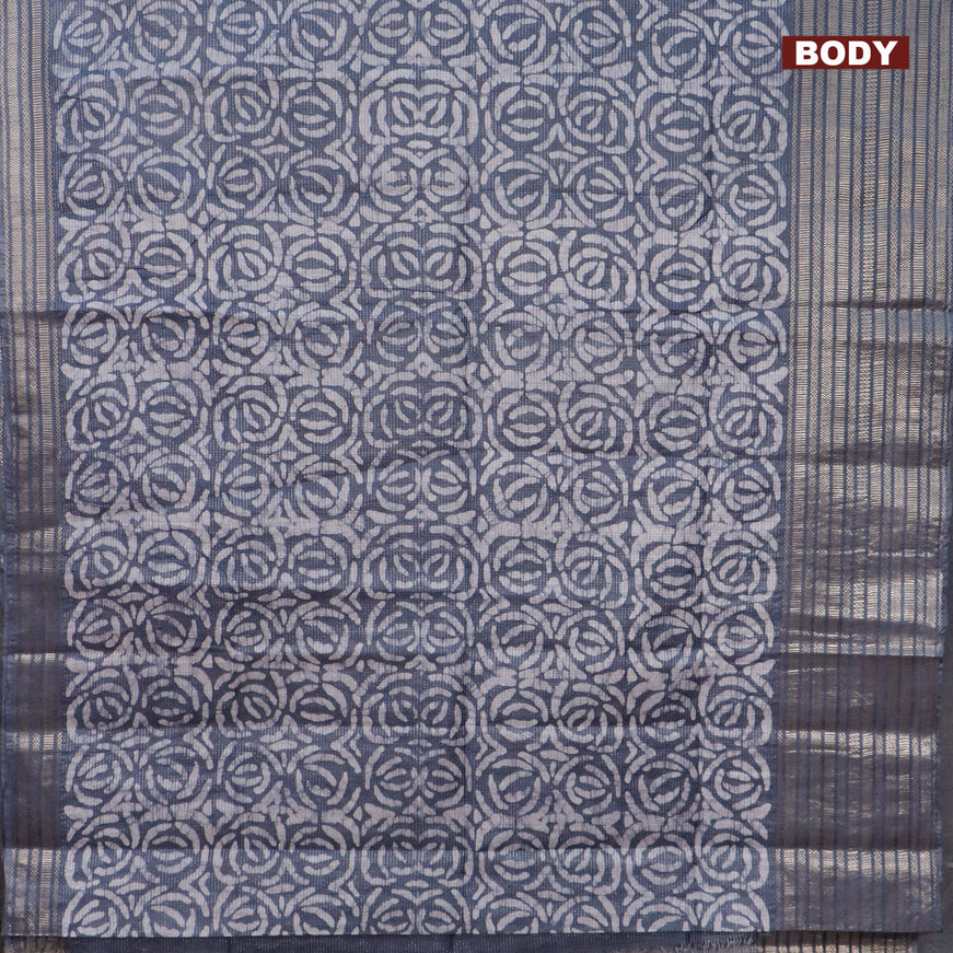 Semi tussar saree grey and off white with allover batik prints and long silver zari woven border