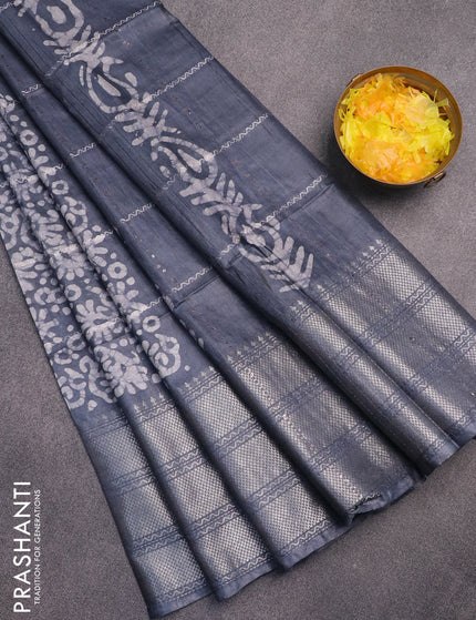 Semi tussar saree grey with allover batik prints and long silver zari woven border