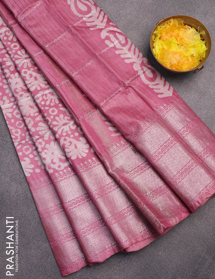 Semi tussar saree mauve pink with allover batik prints and long silver zari woven border