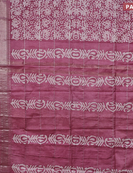 Semi tussar saree mauve pink with allover batik prints and long silver zari woven border