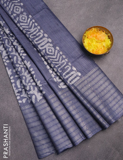 Semi tussar saree grey and off white with allover batik prints and long silver zari woven border