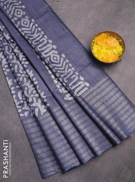 Semi tussar saree grey and off white with allover batik prints and long silver zari woven border