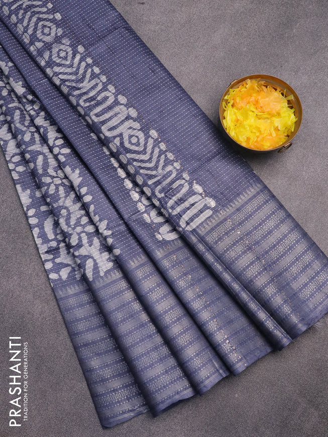 Semi tussar saree grey and off white with allover batik prints and long silver zari woven border