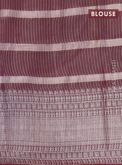 Semi tussar saree coffee brown and beige with allover batik prints and long silver zari woven border