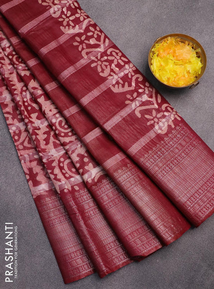 Semi tussar saree dark maroon and beige with allover batik prints and long silver zari woven border