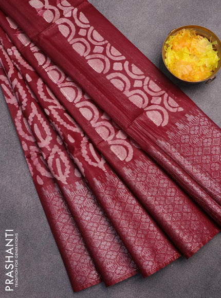 Semi tussar saree dark maroon with allover batik prints and long silver zari woven border