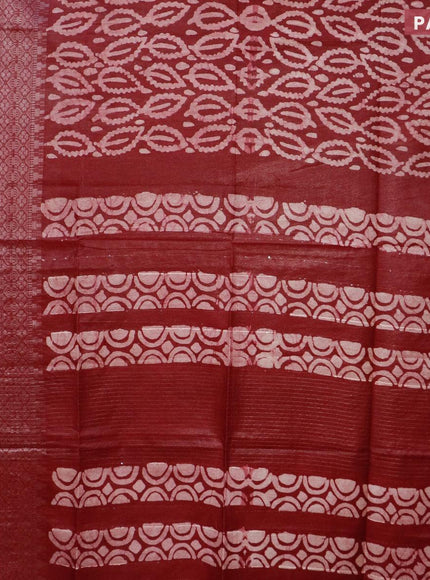 Semi tussar saree dark maroon with allover batik prints and long silver zari woven border