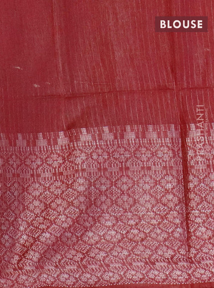 Semi tussar saree dark maroon with allover batik prints and long silver zari woven border