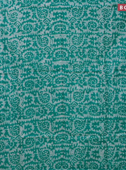 Semi tussar saree teal green and off white with allover batik prints and temple design silver zari woven border