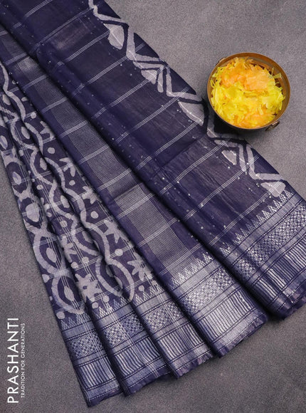 Semi tussar saree navy blue and off white with allover batik prints and long temple design silver zari woven border